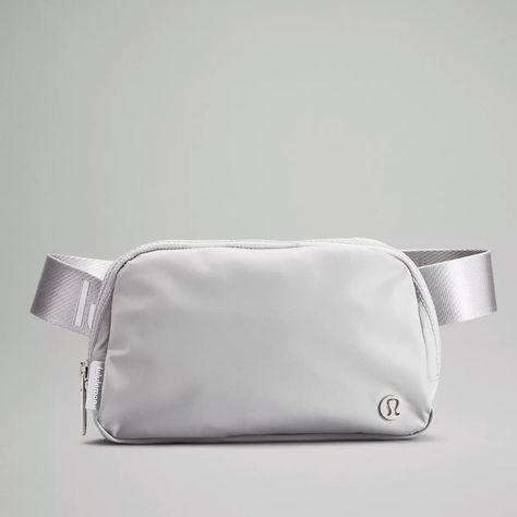 Lululemon Everywhere Belt Bag 1l Silver Drop/White Brand New Phone, Keys, Wallet. Keep Them Close In This Versatile Belt Bag That Helps You Get Out The Door And On To Your Next Adventure. This Item Has A Purchase Limitup To 5 Of The Same Colour Or 10 Of Different Colours. Designed For On The Move. Water-Repellent Fabric. Exterior Zippered Pocket To Secure Your Valuables Interior Pockets Hold The Essentials Once You Find Your Perfect Fit, Tuck The Excess Belt Bag Strap Into The Elastic Loops. Bag Lululemon Bags, New Balance Outfit, Lululemon Everywhere Belt Bag, Everywhere Belt Bag, Running Belt, Festival Bag, Water Repellent Fabric, White Brand, Stanley Cup