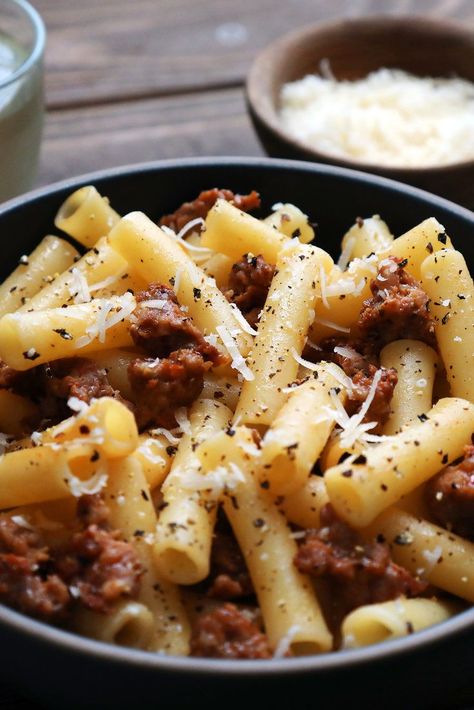 NYT Cooking: Pasta and sausage are a combination that usually suggests a dense, heavy tomato sauce. But it can also mean the very opposite. Sausage, used in small amounts, can contribute to a relatively light, almost delicate pasta sauce. In fact, sausage is a gift to the minimalist cook: it comes already seasoned, and its seasoning can be used to flavor whatever goes with it. White Wine Sausage Pasta, Sausage Squash, Nytimes Cooking, Pasta Parmesan, Pasta Simple, Pasta Sausage, Wine Pasta, White Sausage, Sausage Sauce