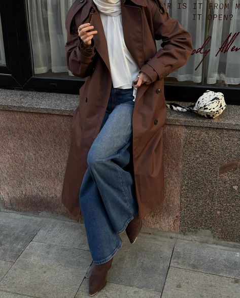 brown mood for this fall 🤎🍂 jeans, coffee, trench, brown trench, fall outfit, fall season, rhode Brown Coat And Jeans Outfit, Hoodie And Trench Coat Outfit, Light Brown Trench Coat Outfit, Dark Brown Trench Coat Outfit, Dark Brown Coat Outfit, Brown Outfit Hijab, Brown Hijab Outfit, Brown Trench Coat Outfit, Dresses Islamic