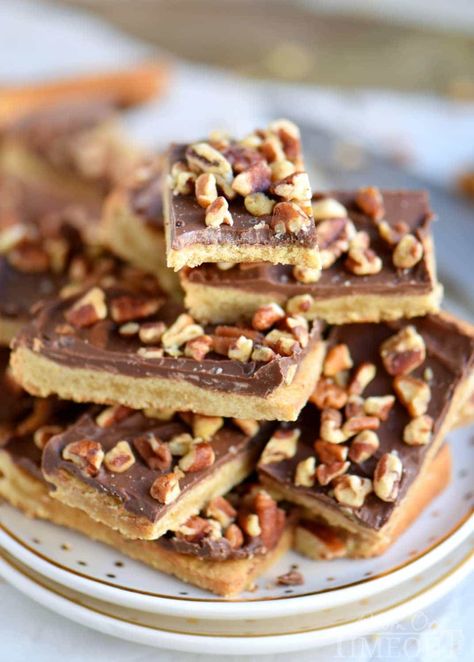 You’re going to go crazy for these Easy Toffee Bars! Simply delicious cookie bars topped with milk chocolate and pecans! Just fantastic! // Mom On Timeout Toffee Bars Recipe, The Kitchen Is My Playground, Easy Toffee, Chocolate Bar Recipe, Cookie Bars Easy, Mom On Timeout, Toffee Recipe, Toffee Bars, Toffee Cookies