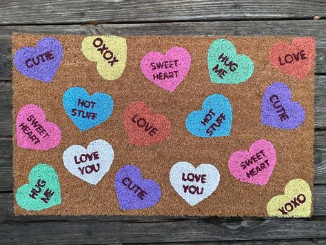 Love is in the air, right at your doorstep! Celebrate Valentine’s Day with our hand-painted doormats that add a touch of romance to your home. Each doormat design can be personalized and we can change any colors to create the perfect doormat for you!