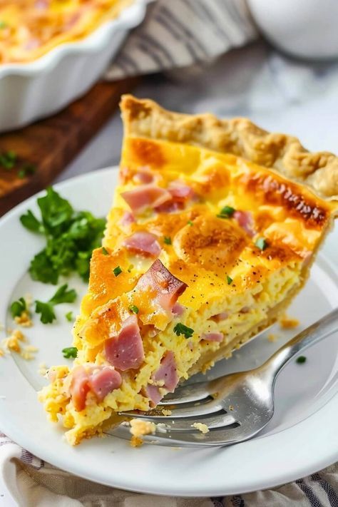 Easy Ham and Cheese Quiche - Insanely Good Swiss Cheese Quiche Recipe, Quiche Ham, Family Breakfast Ideas, Ham Quiche Recipe, Cheese Quiche Recipe, Ham Quiche, Brunch Bake, Ham And Cheese Quiche, Ham Breakfast