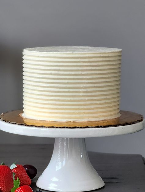 Picture of a white frosted smash cake, on a white cake stand with fruit around it. Plain Smash Cake, Healthy Smash Cake Recipe Frostings, Plain White Smash Cake 1st Birthdays, Plain White Smash Cake, Smash Cake Frosting Healthy, Simple White Smash Cake, Healthy First Birthday Smash Cake, Simple Smash Cake, White Smash Cake