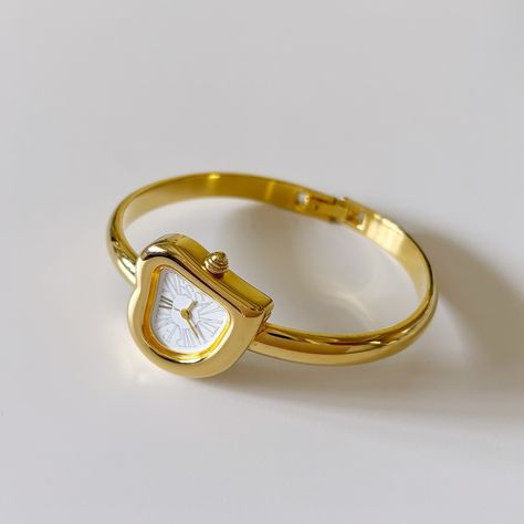 Yves Saint Laurent Heart Shaped Bangle watch from the 90s will be available at 5pm pacific time! Angel Boy, Bangle Watches, Watch Fashion, Jewelry Simple, Hand Ring, Jewelry Lookbook, Fancy Jewelry, Shiny Things, Jewelry Inspo