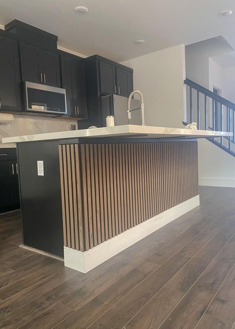 Kitchen Bar Back Panel Ideas, Kitchen Side Wall Ideas, Wooden Slat Kitchen Island, Batton Board Kitchen Island, Wood Slats On Kitchen Island, Island Wrapped In Wood, Slatted Kitchen Island, Slat Wall Kitchen Island, Wood Slat Island Kitchen