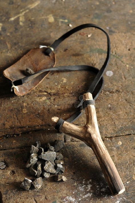 Slingshot. Old wooden slingshot and stone on wooden table , #spon, #wooden, #Slingshot, #slingshot, #table, #stone #ad Wooden Slingshot, Sling Bow, Peter Pan Costumes, One Piece Aesthetic, A Court Of Mist And Fury, Photo B, Black And White Wallpaper, Vintage Tools, Leather Projects