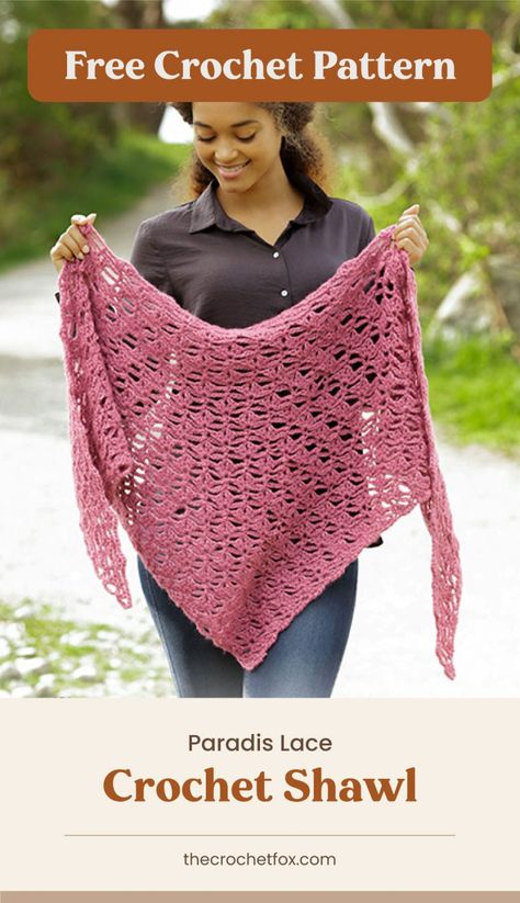 Craft this stunning Paradis Lace Crochet Shawl to add instant elegance to your daily spring outfits. It’s a triangular piece in a fan pattern and has decorative open holes that give the fabric a pretty texture. This shawl makes for a delightful gift idea for special occasions. | More free crochet patterns at thecrochetfox.com Lace Crochet Shawl, Shawl Crochet Pattern Easy, Pocket Crochet, Crochet Wraps, 2023 Crochet, Crochet Prayer Shawls, Lace Shawl Pattern, Crochet Shawl Free, Crochet Lace Shawl