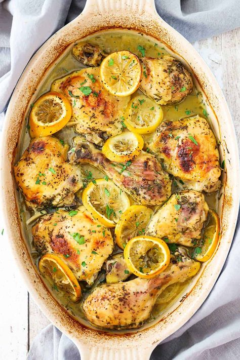 A large oval baking dish filled with lemon roast chicken pieces and lemon slices. Roast Chicken Pieces, Roasted Chicken Pieces, Chicken Pieces Recipes, Lemon Roasted Chicken, Roasted Tomato Basil Soup, Classic French Dishes, Lemon Chicken Recipe, Chicken Pieces, Lemon Slices