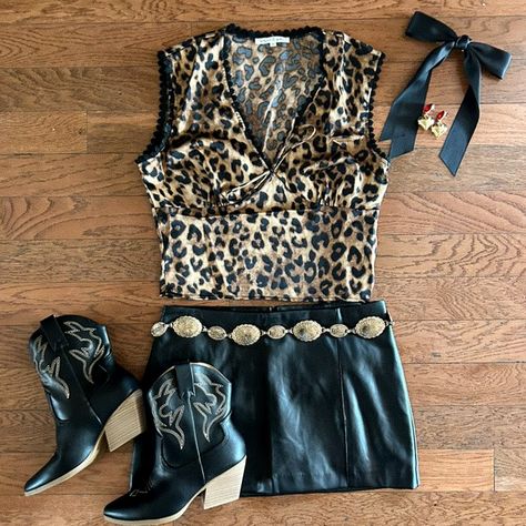 our new leopard print top loves a good night out and a bottomless brunch. now all it needs is its perfect match (ahem: you)💋 . . . western style, nashville bachelorette outfits, trending style, western boutiques, country boutiques, country concert outfits, nashville outfits, cute western outfits, pinup cowgirl, rhinestone cowgirl, yallternative outfits, bachelorette party outfits, 90s country style Western Cheetah Outfit, Nashville Bachelorette Outfits, Pinup Cowgirl, Cowgirl Rhinestone, Outfits Nashville, Cheetah Clothes, Cute Western Outfits, Country Concert Outfits, Leopard Party