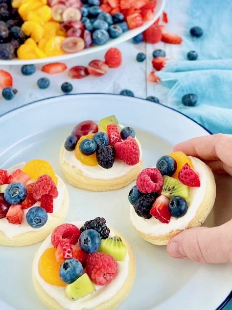 Gluten and Dairy Free Fruit Pizza Cookies with soft round sugar cookies frosted with dreamy cream cheese and beautifully decorated with sweet, juicy fruit. #glutenfree #dairyfree #fruitpizza #summerdesserts Dairy Free Fruit Pizza, Mini Fruit Pizza Cookies, Gluten Free Fruit Pizza, Round Sugar Cookies, Mini Fruit Pizza, Chef Alina, Fruit Pizza Cookies, Fruit Pizza Frosting, Mini Fruit Pizzas