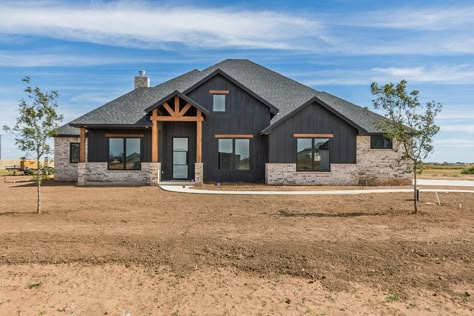 Ranch Style Bungalow, Chelsea Deboer House Exterior, Cedar Accents On House Exterior Ranch, Dark Grey Ranch House Exterior, Side Garage House Plans, Black Siding Exterior With Brick, Black Ranch House Exterior, Dark Farmhouse Exterior, Outside House Colors