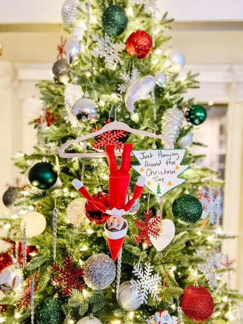 Tree Elf On The Shelf Ideas, Elf On A Shelf Tree Ideas, Elf On The Shelf Ideas With Christmas Tree, Elf On The Shelf On Christmas Tree, Elf On Shelf Christmas Tree Ideas, Beginner Elf On The Shelf Ideas, Christmas Tree Elf On The Shelf, Elf On The Shelf Ideas Christmas Tree, Hanging Elf On The Shelf Ideas