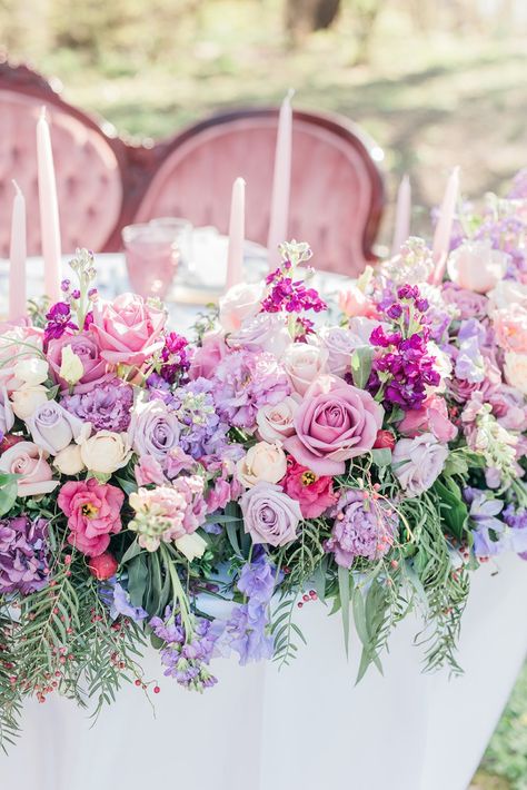 romantic pink and purple wedding flowers for your sweetheart table #fantasy #rapunzel #weddinginvitation #fairytalewedding #bespoke #weddinginspiration #weddingflowers #florals Magenta And Lilac Wedding, Pink And Lilac Flower Arrangements, Unique Wedding Flower Ideas, Pink And Purple Bridesmaid Dresses, Lavender And Pink Wedding, Wedding Table Pink, Pink Purple Wedding, Rapunzel Wedding, Tangled Wedding