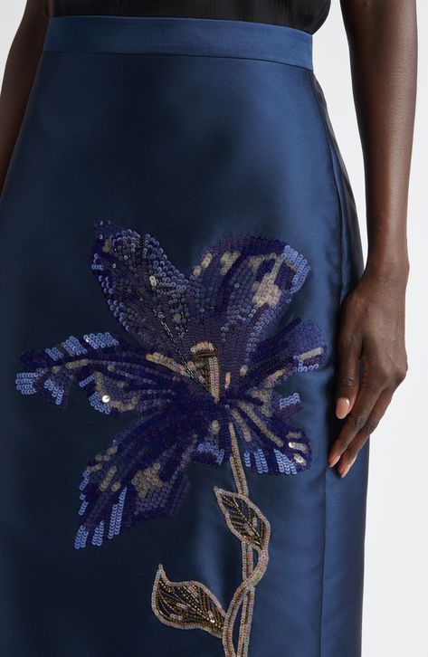 Sequins, beads and ornate embroidery animate a stunning floral appliqué on this lustrous mikado pencil skirt from Erdem's collection honoring operatic icon Maria Callas. Incorporating hallmarks of Callas's heyday, this floral-flocked presentation features patterns inspired by hand-painted designs of the '50s and '60s. Hidden back-zip closure Back vent Silk lining 85% polyester, 15% silk Dry clean Made in the UK Designer Clothing Patch Work Pattern, Floral Beading Patterns, Versace Print Pattern, Embroidery Skirts, Hand Painted Skirt, Beaded Clothes, Painted Skirt, Embroidery On Silk, Yarn Color Combinations