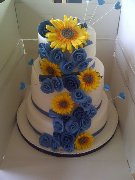 Sunflower And Blue Rose Wedding, Sunflower Rose Wedding Cake, Wedding Cake Sunflower And Roses, Sunflower Blue Roses Wedding, Blue Roses And Sunflowers Centerpiece, Blue Cake With Sunflowers, Blue Rose Cake, Royal Blue Wedding Cakes, Blue Roses Wedding