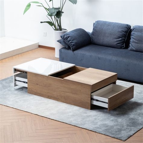 The brown wood and white finish coffee table features multiple storage spaces. The two drawers and two hidden compartments underneath the sliding tabletop can store all your media essentials. Brown Coffee Table, Drawer Lights, Wood And White, Hidden Compartments, White Drawers, Pine Table, Sofa End Tables, Drawer Design, Storage Design