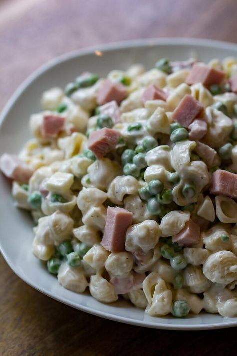 My easy Ham and Pea Pasta Salad is the perfect side to bring to any barbecue or cookout! Use a good deli ham steak, or my leftover Double-Smoked Pineapple Glazed Ham if you really want to win bbq friends, but either way, it’ll be delicious. Ham and pea pasta salad offers a spin on my macaroni salad. Ham and peas add plenty of protein to macaroni salad so it is like a bit of an upgrade on the filling and fulfilling side of a typical pasta salad. Ham And Pea Pasta Salad, Pea Pasta Salad, Smoked Pineapple, Ham Pasta Salad, Salad With Ham, Ham And Peas, Cheese Peas, Pea Pasta, Ham Steak