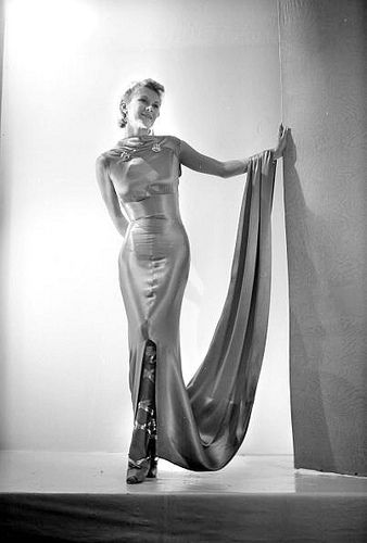 Model in silk charmeuse evening dress with ballet style shoes by Schiaparelli, photo by Boris Lipnitzki, 1937 | Flickr - Photo Sharing! 1930s Glamour, Schiaparelli Dress, Vintage Schiaparelli, Vintage Fashion 1930s, Gown Gold, Model Magazine, Ad Magazine, 30s Fashion, Elsa Schiaparelli