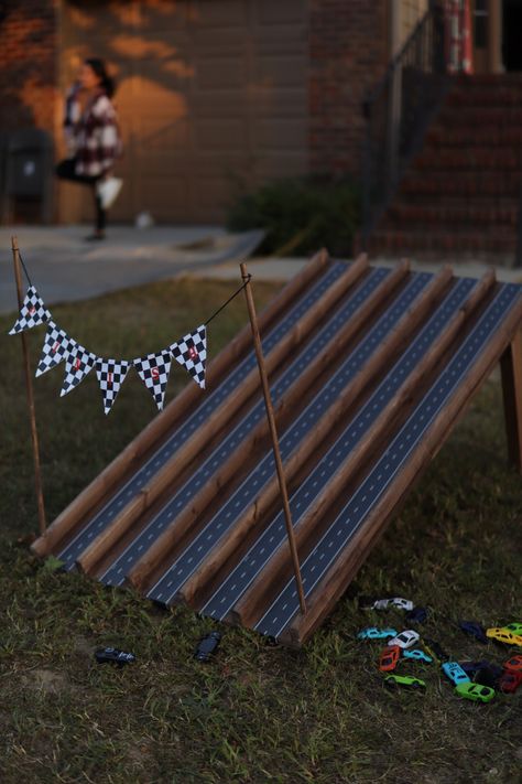 Home Depot bought wood and tape from Amazon! Super quick and easy race, car ramp for any child birthday. Was used for a “fast one” birthday party. Cars Themed Birthday Party Activities, 2 Fast Birthday Activities, Racecar Birthday Games, Cars Birthday Party Games Activities, Pit Stop Party, Off Roading Birthday Party, Fast One Decorations, Cars Birthday Activities, Blue Race Car Birthday Party Ideas