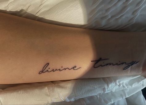 Fineline tattoo In Divine Timing Tattoo, Divina Tattoo Word, Divine Tattoo Font, Divine Tattoo Word, Divine Feminine Script Tattoo, Divine Feminine Tattoo Cursive, Divine Timing Tattoo, Divine Tattoo, Hidden Tattoos