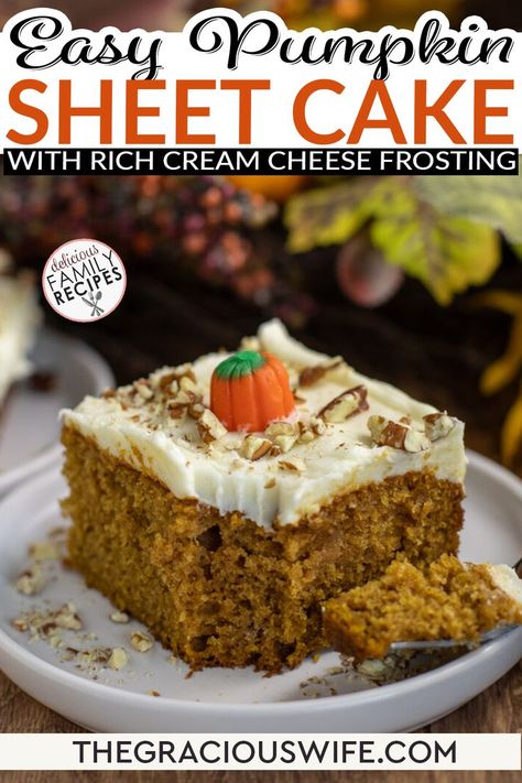 A slice of spiced Classic Spiced Pumpkin Sheet Cake with Cream Cheese Frosting sits elegantly on a white plate. Topped with a candy pumpkin and chopped nuts, it captures the essence of fall. In the blurred background, autumn-themed decor enhances this cozy Pumpkin Sheet Cake moment. Pumpkin Texas Sheet Cake With Buttermilk Frosting, Pumpkin Sheet Cake With Cream Cheese, Pumpkin Cake With Cream Cheese Frosting, Simple Cream Cheese Frosting, Best Pumpkin Cake, Pumpkin World, Fall Desserts Pumpkin, Pumpkin Cakes, Pumpkin Sheet Cake