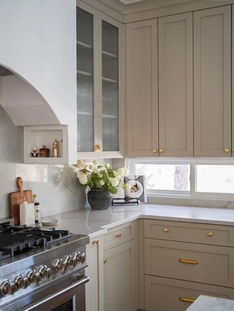 Taupe colors for kitchen cabinets Cream Cabinets Black Appliances, White Kitchen With Taupe Island, Small Taupe Kitchen, Taupe Shaker Kitchen, Almond Beige Kitchen, Painted Brown Kitchen Cabinets, Taupe Kitchen Island, Kirchen Cabinet, Light Taupe Kitchen Cabinets