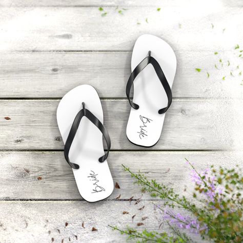 18.03 USD All-day comfort is the name of the game when summer is on. These personalized flip flops can now take on your unique designs add some character to your summer escapades. With an easy slip-on design, a cushioned footbed, and top-tier printing fidelity, these flip flops are a guaranteed summer hit. .: 5/8" (15 mm) thick EVA sole .: 100% polyester suede sole cover .: Black PVC strap .: Multiple sizes Beach Wedding Flip Flops, Flip Flops Wedding, Bride Flip Flops, Bridesmaid Flip Flops, Bride Hoodie, Flower Girl Petals, Burgundy And Blush Wedding, Bridal Flip Flops, Personalized Flip Flops