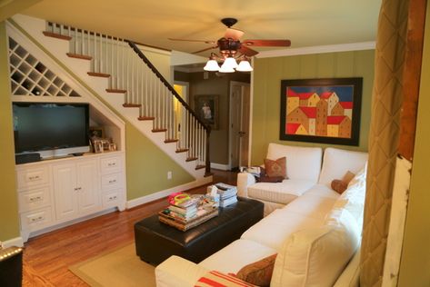 TV space under stairs Tv Under Stairs, Living Room Under Stairs, Staircase In Living Room, Under Stairs Ideas, Under Staircase, Room Under Stairs, White Paint Color, Under Stair, Stair Ideas