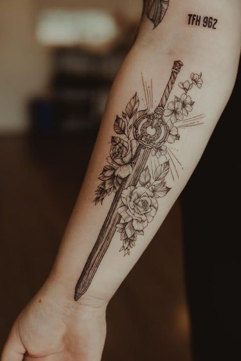 210 Best Sword Tattoo Designs With Meanings (2023) - TattoosBoyGirl Skyrim Forearm Tattoo, Dawnbreaker Skyrim Tattoo, Skyrim Inspired Tattoos, Regal Tattoos, Dawnbreaker Tattoo, Skyrim Tattoo Ideas, Skyrim Swords, Elder Scrolls Tattoo, Skyrim Tattoo