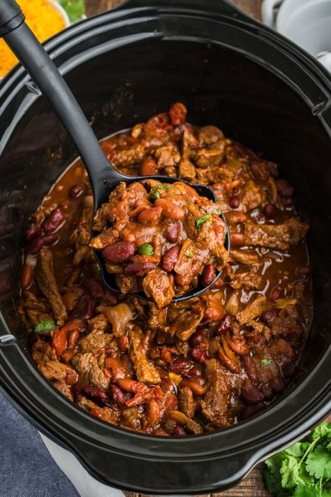 Steak Chili is a rich, meaty chili con carne recipe with chunks of tender beef, beans and spices. It's the perfect meal for cool weather. Slow Cooker Steak Chili, Steak Chili Recipe, Meaty Chili, Chili Con Carne Recipe, Carne Recipe, Steak Chili, Con Carne Recipe, Slow Cooker Steak, Chili Chili