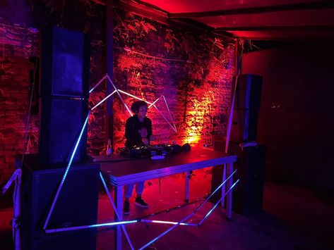 dj performing with led stripes scenography Halloween Dj Booth, Goth Party, Dj Set, Crystal Cave, Dj Booth, June 22, Stage Design, Event Decor, Party Ideas