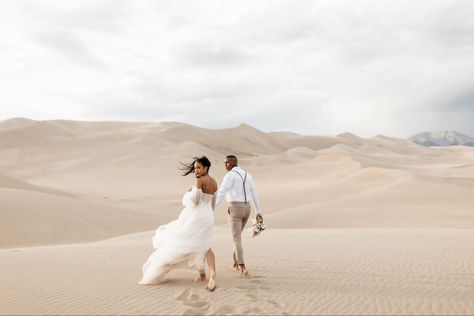 The sand dunes can be a unique location for an elopement or micro wedding and is much more affordable than some options. Sand Dunes Wedding, Sand Dunes Elopement, Desert Photoshoot Ideas, Sand Dunes Photoshoot, Sand Wedding, Desert Shoot, Moodboard Wedding, Great Sand Dunes National Park, Desert Photoshoot