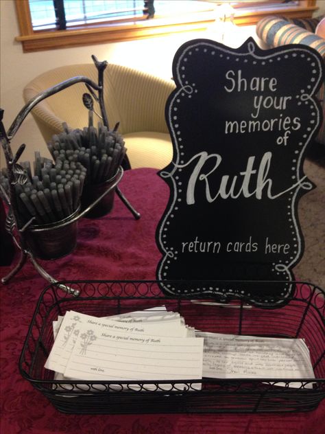 Ruth Peeples memorial table . Each guest is given a memory card and pen to share special remembrances. Return card to basket on way out. Family reads cards at later date. Celebration Of Life Memorial Table Ideas, Celebration Of Life Table Centerpieces, Celebration Of Life Memorial Ideas Party, Celebration Of Life Centerpieces, Celebration Of Life Party, Memorial Service Ideas, Memorial Service Decorations, Memorial Table, Memorial Ideas