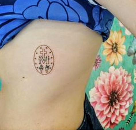 Miraculous Medallion tattoo Miraculous Medal Tattoo, Blessed Mother Tattoo, Medallion Tattoo, Virgen Mary Tattoo, Mother Mary Tattoos, Catholic Tattoos, Rosary Tattoo, Photography Tattoo, Mary Tattoo