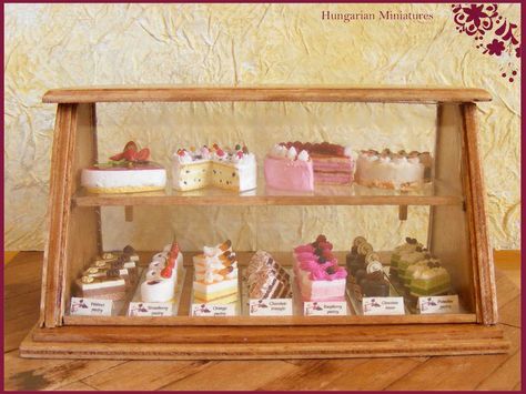 fancy cakes in bakery case Cupcake Trailer, Pastry Case, Bakery Display Case, Pastry Display, Bakery Shop Design, Cute Bakery, Bakery Interior, Miniature Bakery, Bakery Display