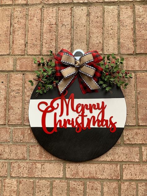 Merry Christmas Home Sign, Buffalo Plaid Front Door Decor, Round Door Decoration, Front Door Wreath, Door Hanger, Home Door Hanger 18x18 wood round door hanger, 1/2 inch thick. There is a hanger on back Made from wood. Greetings! Decorate your space with This Merry Christmas Wood Front door Decor! Charger Plate Crafts, Wooden Rounds, Home Door Hanger, Cricut Christmas Ideas, Wreath Door Hanger, Circle Crafts, Front Door Christmas Decorations, Door Signs Diy, Wood Wreath