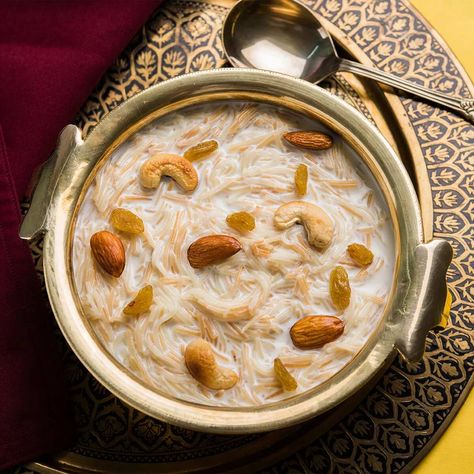 Vermicelli cake, also called vam-a-zelli in Guyanese patois, is a dessert made from vermicelli noodles that have been simmered in milk, flavored with cinnamon, nutmeg, and other spices or extracts. It is rich in carbohydrates that are essential for energy production in the body. Vermicelli rice noodles are not a good source of protein and are therefore cooked with other ingredients to obtain benefit from it. Vermicelli is commonly used to make kheer (popularly called seviyan kheer) as bhog for m Vermicelli Pudding, Semiya Payasam, Festive Breakfast, Payasam Recipe, Sheer Khurma, Kheer Recipe, Indian Subcontinent, Roasted Cashews, Cardamom Powder