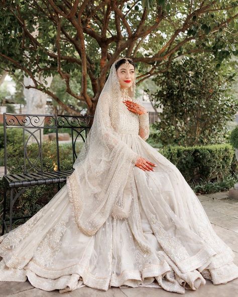 Faiza Saqlain | Our stunning client, Wafa, dazzles in the opulently crafted Anamta as she shines bright on her wedding day 🤍💫 @roohafzamilk 📸:… | Instagram Faiza Saqlain Bridal, Muslim Wedding Dresses Indian, Nikkah Board, White Indian Wedding Dress, Indian Wedding Dress Traditional, Faiza Saqlain, Walima Dresses, Ethnic Gowns, Nikah Outfit