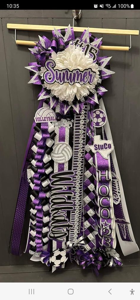 Purple White And Silver Homecoming Mums, Hocoming Mum Ideas, Homecoming Mum Head Ideas, Purple And White Mums Homecoming, Purple And Gold Mums Homecoming, Purple And Gold Homecoming Mums, Purple Homecoming Mum, Junior Year Mum Ideas, Green Mums Homecoming