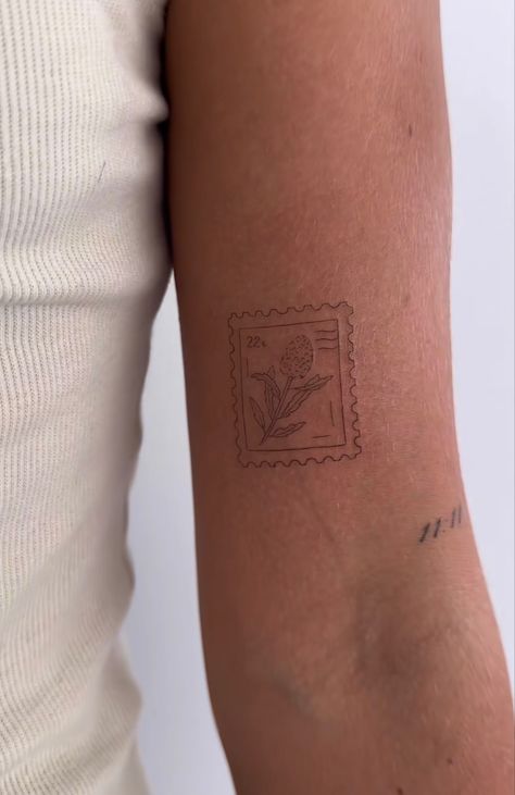 French Stamp Tattoo, London Post Stamp Tattoo, Stamp Tattoo Placement Ideas, Postage Stamp Flower Tattoo, Velaris Stamp Tattoo, Spain Stamp Tattoo, Travel Stamp Tattoo, Tattoo Timbre, Postage Stamp Tattoo Ideas