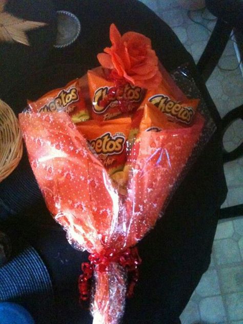 FLAMING HOT CHEETO BOUQUETS Hot Cheetos Valentine Ideas, Hot Cheetos Bouquet, How To Make A Hot Cheeto Bouquet, Flaming Hot Cheetos Party Ideas, Chip Bouquet Valentines Day, Hot Flaming Cheetos, Flamin Hot Cheetos Aesthetic, Flaming Hot Cheetos, Food Bouquet