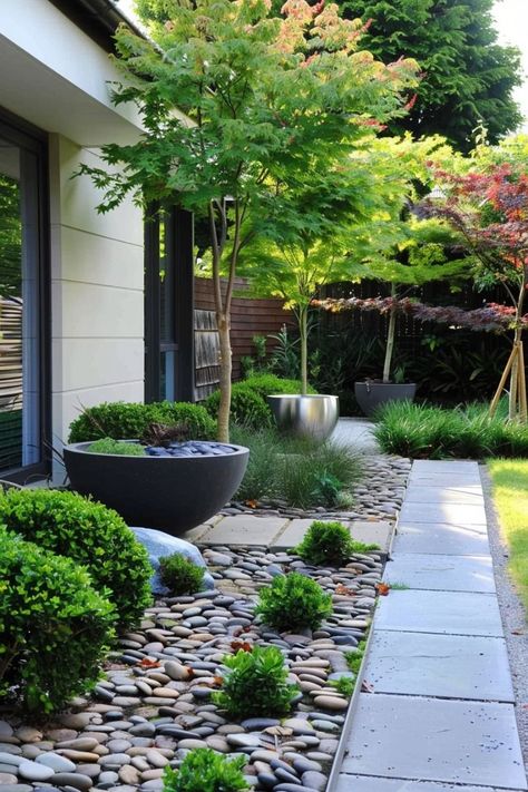 Utilize vertical space by installing green walls or vertical planters. These can be particularly effective for smaller yards or urban spaces. Japanese Garden Plants, Front Door Plants, Texas Landscape, Small Japanese Garden, Small Garden Ideas, Garden Decoration Ideas, Japanese Zen Garden, Minimalist Garden, Garden Levels