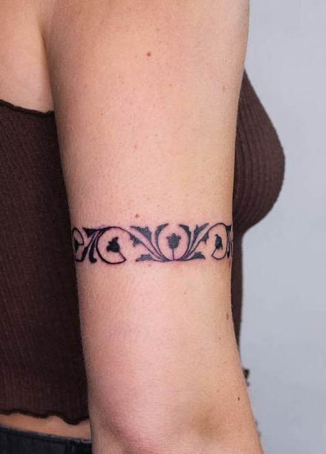 37 Stunning Armband Tattoos For Women - Our Mindful Life Feminine Cuff Tattoo, Tattoos Wrapping Around Arm, Flower Tattoo Arm Bands, Bands Around Arm Tattoo, All Around Arm Tattoo, Arm Wrap Around Tattoos For Women, Around Arm Tattoo Band Women, Upper Armband Tattoo For Women, Floral Celtic Tattoo