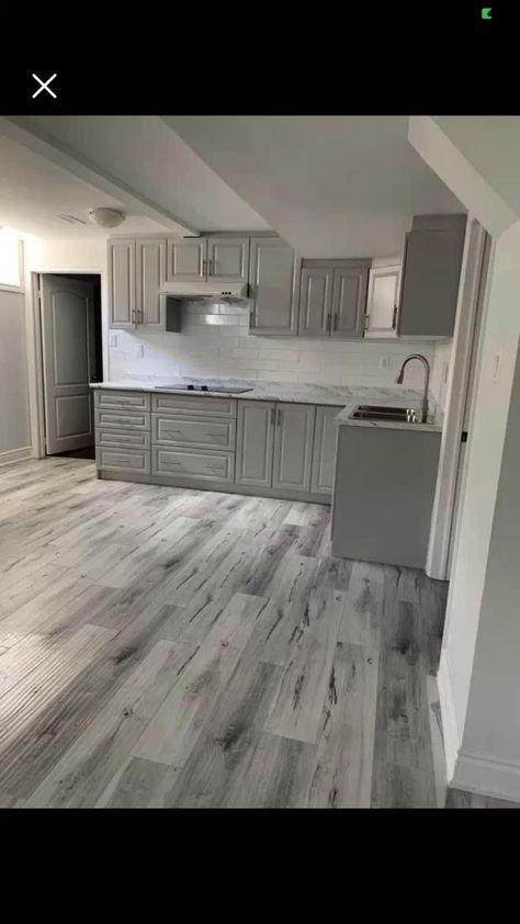 (ad) The Best living room Flooring Ideas 2022 Grey Laminate Flooring Kitchen, Laminate Living Room, Living Room Flooring Ideas, Room Flooring Ideas, Grey Wood Floors Kitchen, Gray Wood Tile Flooring, Light Grey Flooring, Grey Laminate Flooring, Grey Cupboards