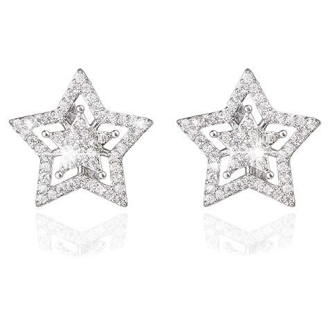 PRICES MAY VARY. Silver Stud Earrings - These star earrings exude elegance with their charming and distinctive design, setting them apart from your everyday stud earrings. With their unique style, they have the power to enhance your look and captivate the attention of everyone around you. Cubic Zirconia Stud Earrings - These CZ earrings are crafted from high-quality alloy, cubic zirconia. They are highly polished, nickel-free, low-allergenic, and always shiny. Our Shining earrings are most suita Everyday Stud Earrings, Mens Earrings, Mens Earrings Studs, Everyday Earrings Studs, Silver Star Earrings, Stud Earrings For Men, Earrings For Men, Party Dance, Sparkly Earrings