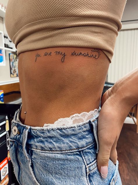 Rib And Side Tattoos For Women, Side Tattoos With Meaning, Mom And Daughter Tattoos You Are My Sunshine, Simple Classy Tattoos For Women, Tattoos For Women Deep Meaning, Tattoos You Are My Sunshine, Your The Sun To Me Tattoo, Country Meaningful Tattoos, Mother Daughter Tattoos Ribcage