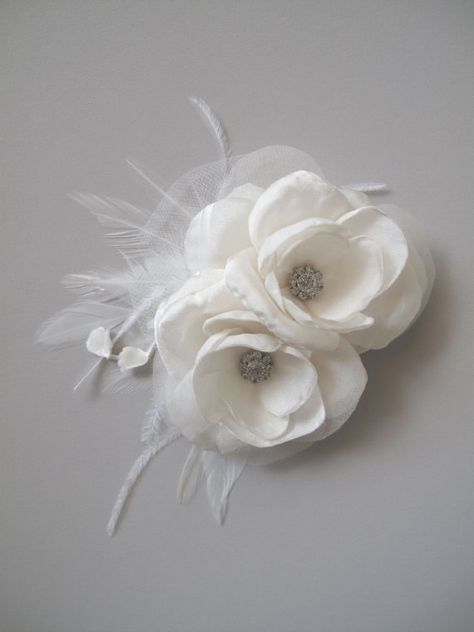 Love these feather hairpieces:    http://www.etsy.com/listing/92814517/beth-ivory-bridal-hair-piece-fascinator?ref=sr_list_23&sref=&ga_search_submit=&ga_search_query=feather+hair+wedding&ga_view_type=list&ga_ship_to=US&ga_search_type=handmade&ga_facet=handmade White Hair Flowers, Bridal Fascinator, Bridal Hair Piece, Feather Hair, Hair Flowers, Feather Fascinators, Hair Flower, Wedding Hair Flowers, Ivory Bridal