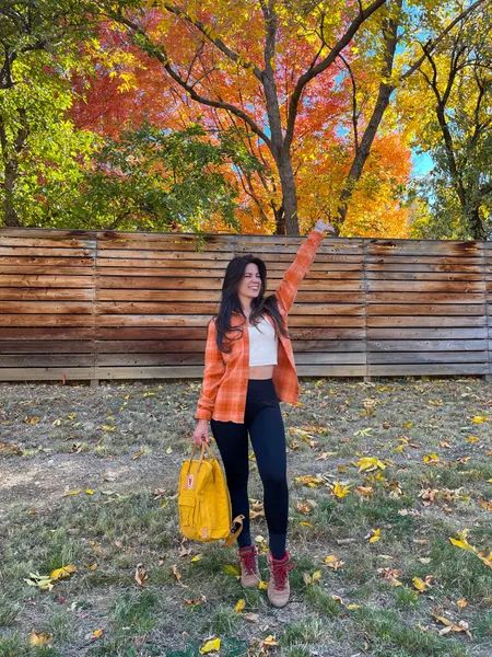 Fall Hiking Outfit! This orange flannel is giving me life. This specific shirt is discontinued but I've added a few alternative shirts with orange toned options! Pair it with black leggings & a sports bra, and add a long sleeve shirt & beanie if it's cold outside! Alternative Shirts, Fall Hiking Outfit, Orange Flannel, Outfit Yellow, Hiking Outfit Fall, Fall Hiking, It's Cold Outside, Cold Outside, Its Cold Outside