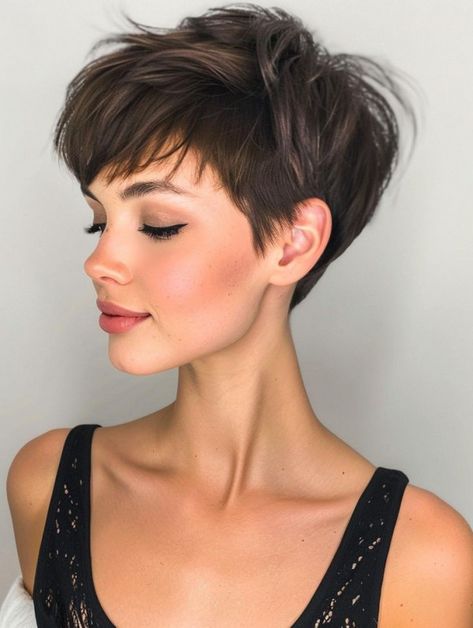 Pixie Cut with Side-Swept Bangs, short haircuts with fringe Pixie Bob Haircut With Bangs, Long Pixie Cut With Bangs, Asymmetrical Pixie Haircut, Pixie Cut With Long Bangs, Brunette Pixie, Easy Short Haircuts, Pixie Haircut Styles, Short Haircuts With Bangs, Curly Pixie Haircuts