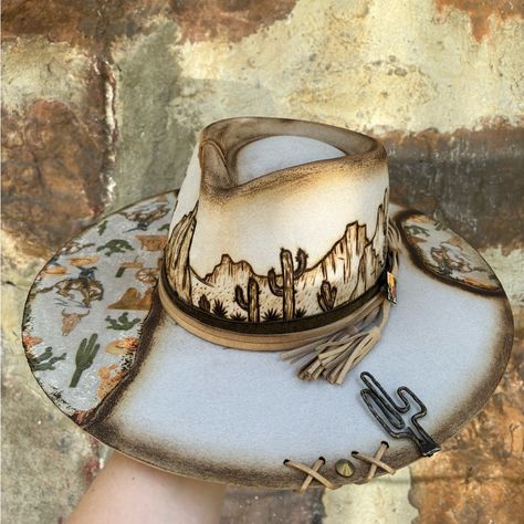 Brand New, Never Worn, Shayanne Os Fits All With Adjustable Head Band Inside To Fit Sz Small-Large! Beautiful One Of Kind Hat With A Desert Scene Around The Crown And Western Pattern Added On The Brim! Thanks For Looking! Charlie 1 Horse Atwood Cody James Ariat Stetson Bailey Shyanne Olive & Pique Western Cowboy Hats Cowgirl Hats Custom Burned Hats, Diy Western Accessories, Hat Burning Patterns, Custom Wide Brim Hats, Boho Wedding Hat, Burnt Cowboy Hat, Wedding Cowgirl Hat, Custom Hats For Women, Burned Cowboy Hats